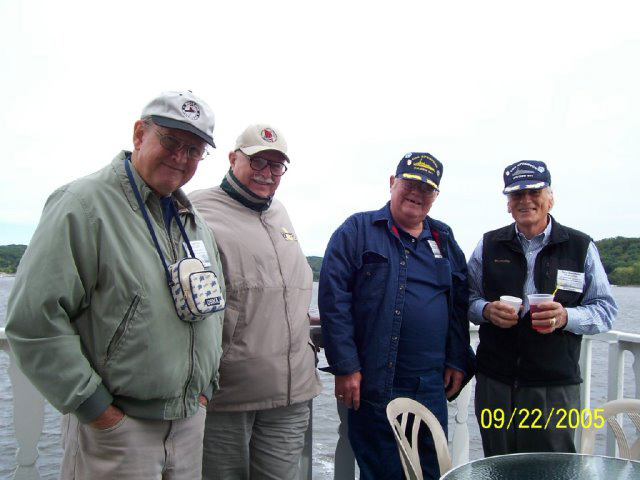 Jim Sagerholm, J.J. Goodwin, Mike Holmes and Doug Menikheim aboard The Andiamo