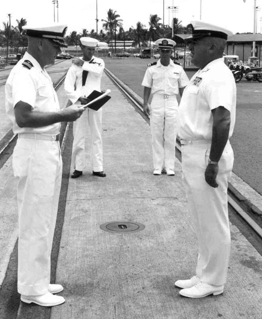 USS Sproston (DD-577) CDR Hoffman presenting CPO with an award during a Personal Inspection, Baker Pier, Honolulu, Hawaii - 1966