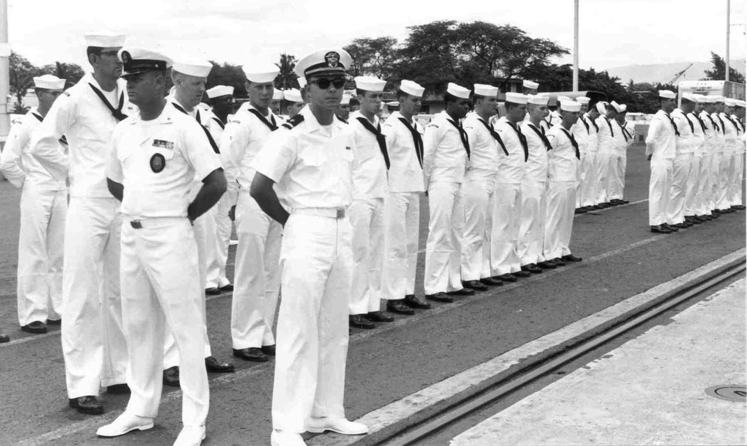 USS Sproston (DD-577) CMAA and Division Officer awaiting inspection party, Baker Pier, Honolulu, Hawaii - 1966