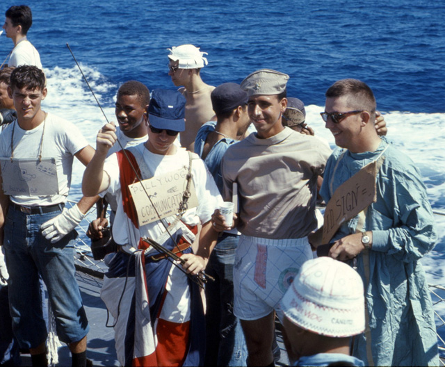 LTjg Michael Kenney (Communicator), LTjg Tim Morsani and unidentified shipmate (ID Sign) crossing the equator - USS Sproston 1967