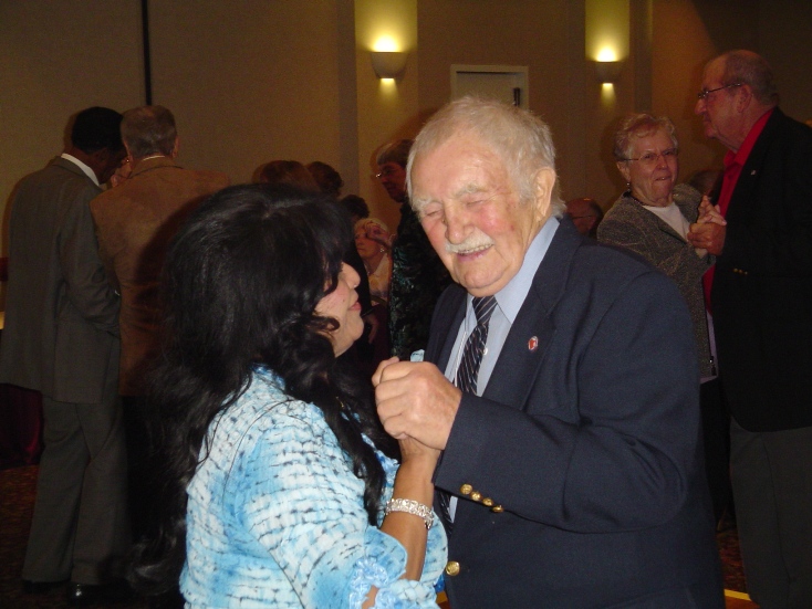 Carmencita Kenney dancing with WWII Shipmate Ray Minko at the banquet - Seattle, Washington