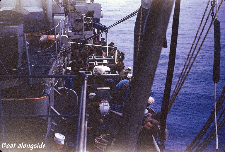 Boat alongside USS Sproston