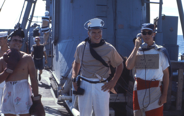 QM2 Gerger, unidentified shipmate and LTjg Michael Kenney crossing the equator - USS Sproston 1967