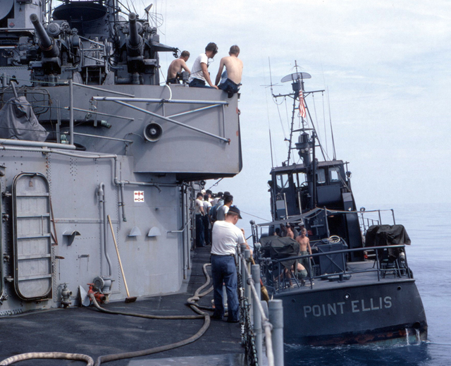 US Coast Guard ship Point Ellis (WPB 82330) obtaining fresh water supply from the USS Sproston - Vietnam 1967