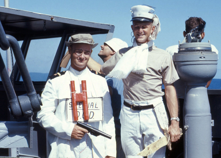 LTjg D. Printy and unidentified officer crossing the equator - USS Sproston 1967