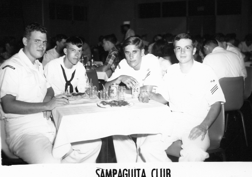 RM3 Woods, unidentified sailor, Jack Barret from the USS Long Beach, and SM Dean Dussell at the Sampaguita Club